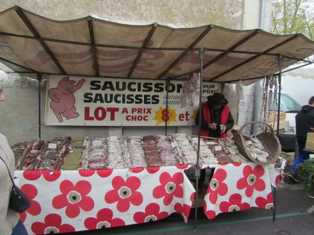 Several sausage booths carried a wide variety of kinds and sizes of sausages.