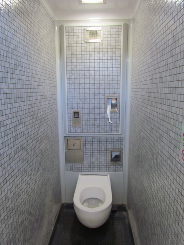 There were 2 doors to the outside marked for women and 2 marked men. But the insides looked exactly the same. It's wet inside when you enter because when somebody leaves it sprays the entire room with disinfectant. 