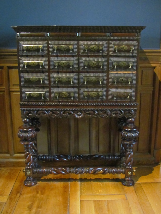 I don't know that this is either. It was in the same room with the item in the previous photo. It looks like a series of little drawers, each with its own individual lock and key.