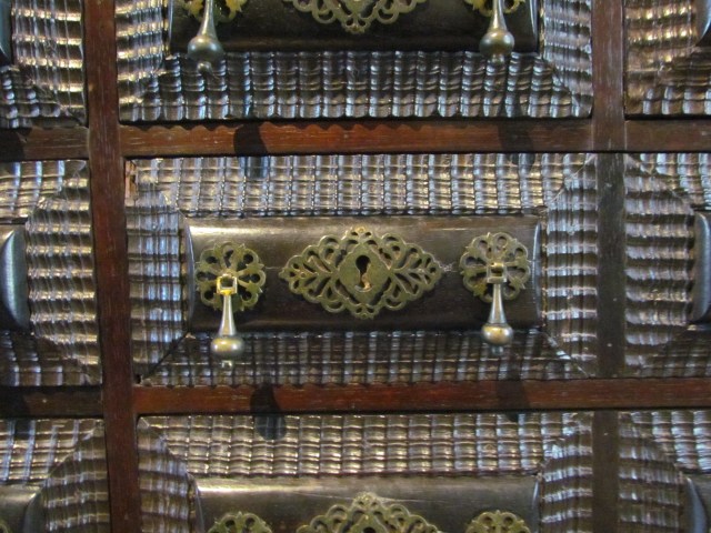 This is a close-up of one of the little individual drawers. Most unusual.